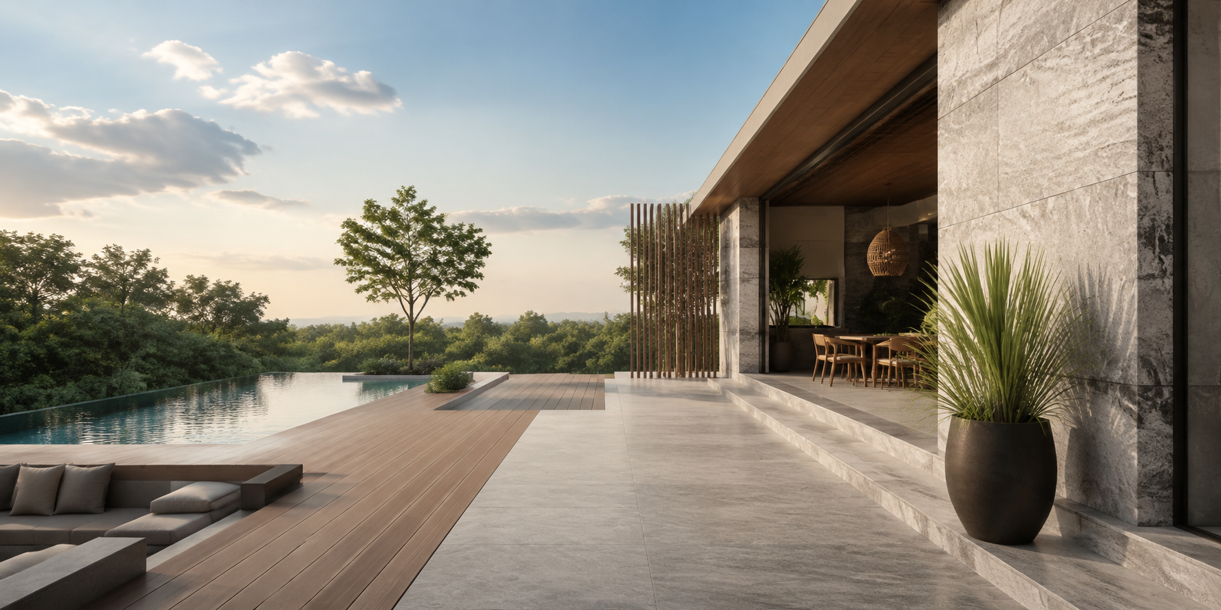 Terraza contemporánea con deck compuesto, revestimiento de piedra y piso cerámico junto a una piscina